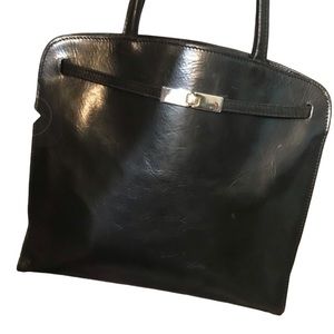 Furla black classic leather handbag silver hardware locking front clasp